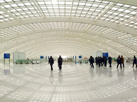 people walking inside beijing airport