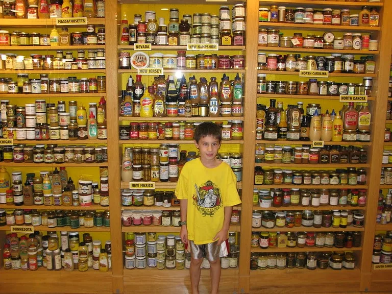 A shelf full of mustard at the National Mustard Museum.