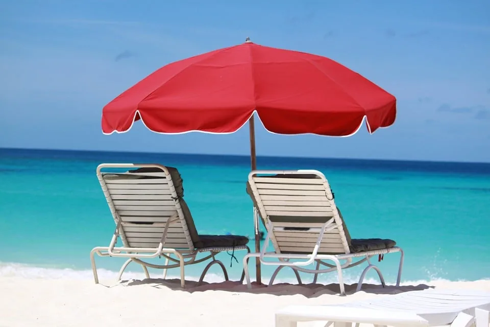 A pair of seabeds on a beach in Anguilla
