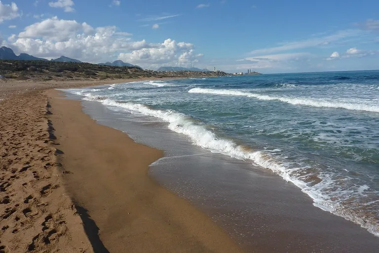 Alagadi Beach with gentle waves.
