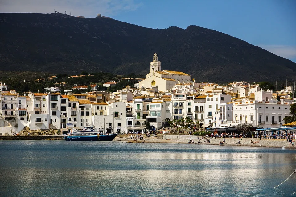 White-washed houses overlooking a calm bay in Cadaques