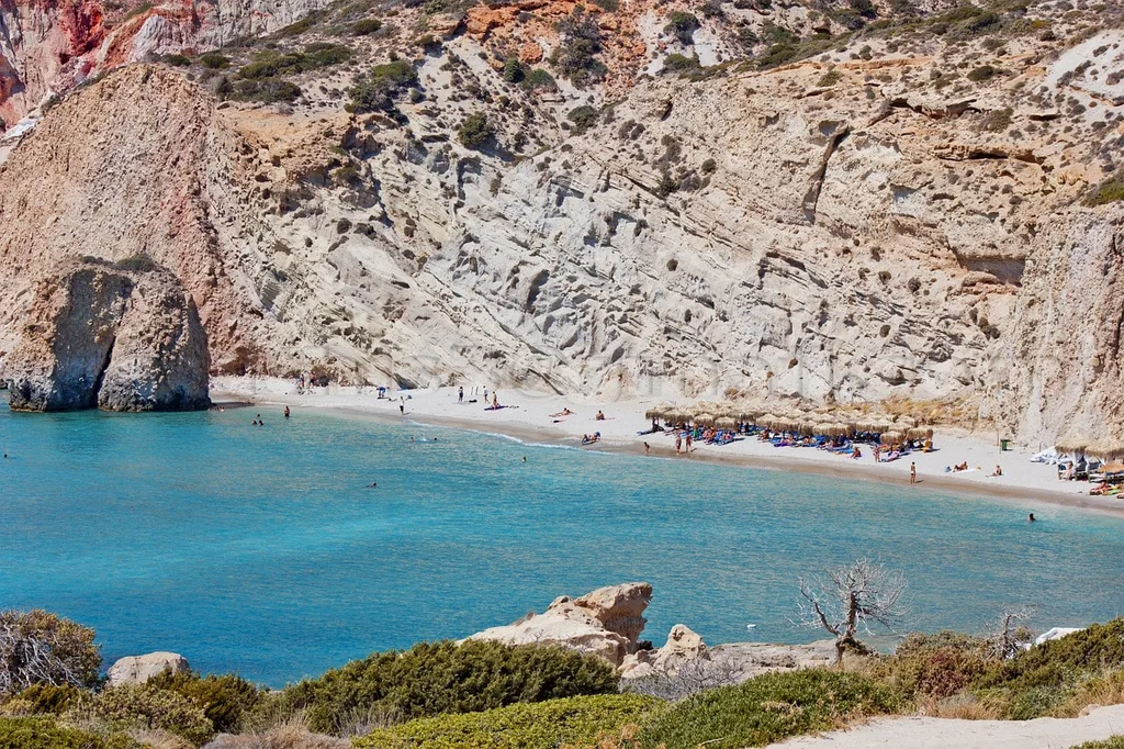 Formidable cliffs above Firiplaka beach in Milos