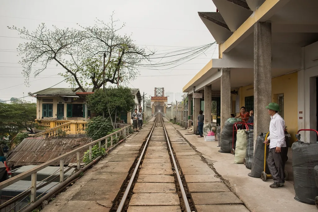 Ga Long Bien, a small train station with view of the steel bridge over the Red River