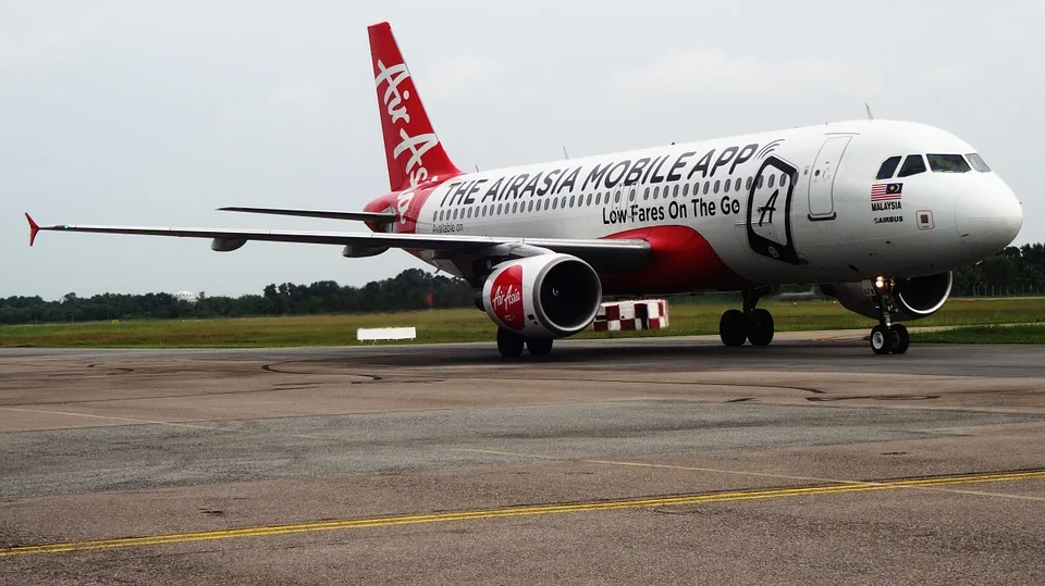 AirAsia Plane with a Mobile App Ad