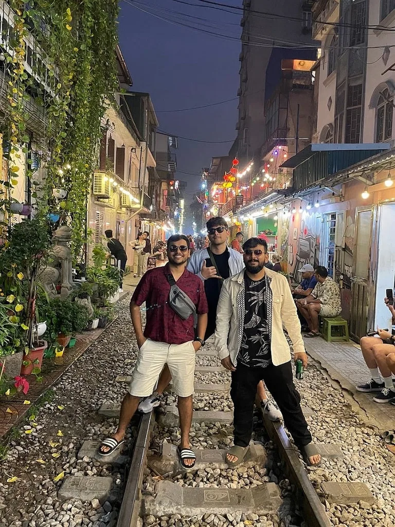 With my friends on the Walking Train Steet. Photo by the Author.