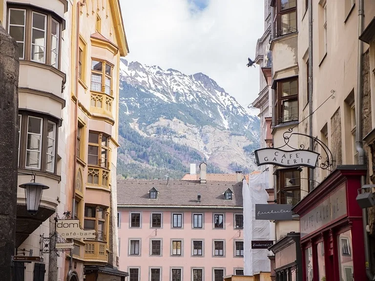 Snow-capped mountains above the old town of Innsbruck