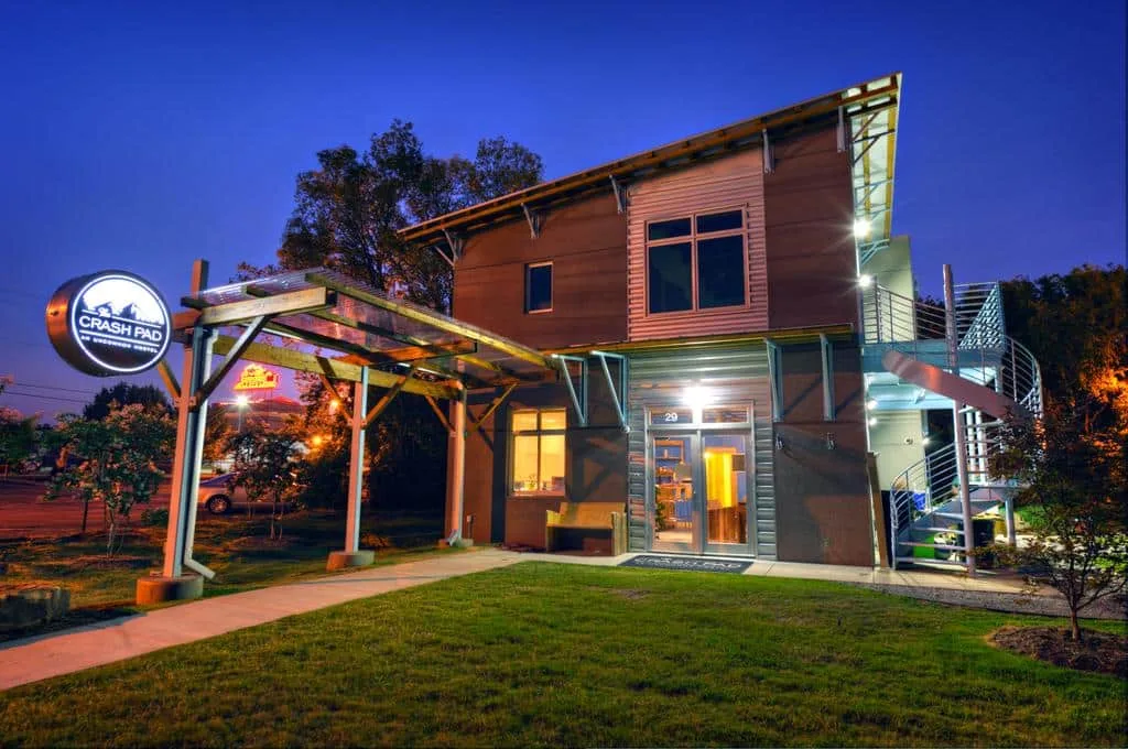 The entrance to The Crash Pad at night.