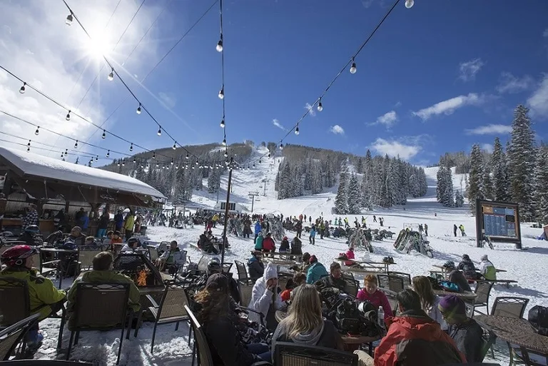 Visitors having a drink or lunch at Purgatory Resort
