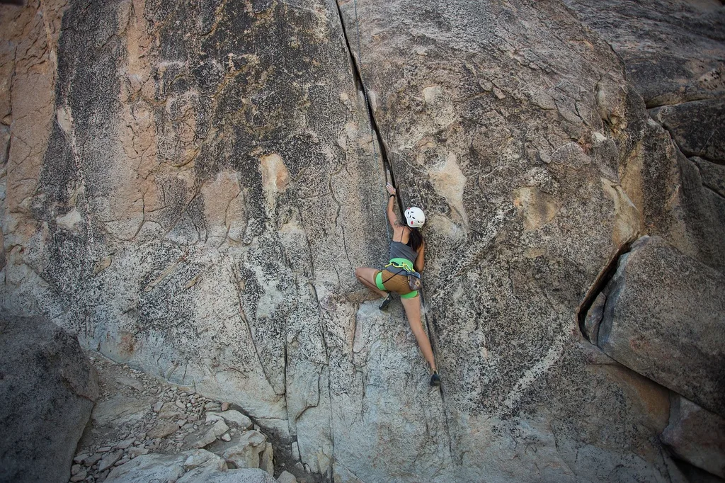 Climbing on rock in Batu Caves (Malaysia)